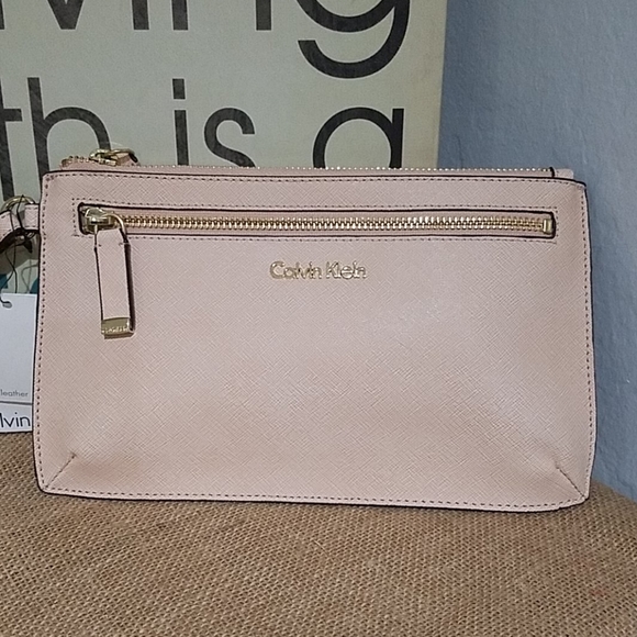 Calvin Klein Handbags - NWT CALVIN KLEIN LEATHER PALE PINK WRISTLET CLUTCH
